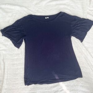 Ty Alexander’s Blue Ruffled Sleeve Shirt